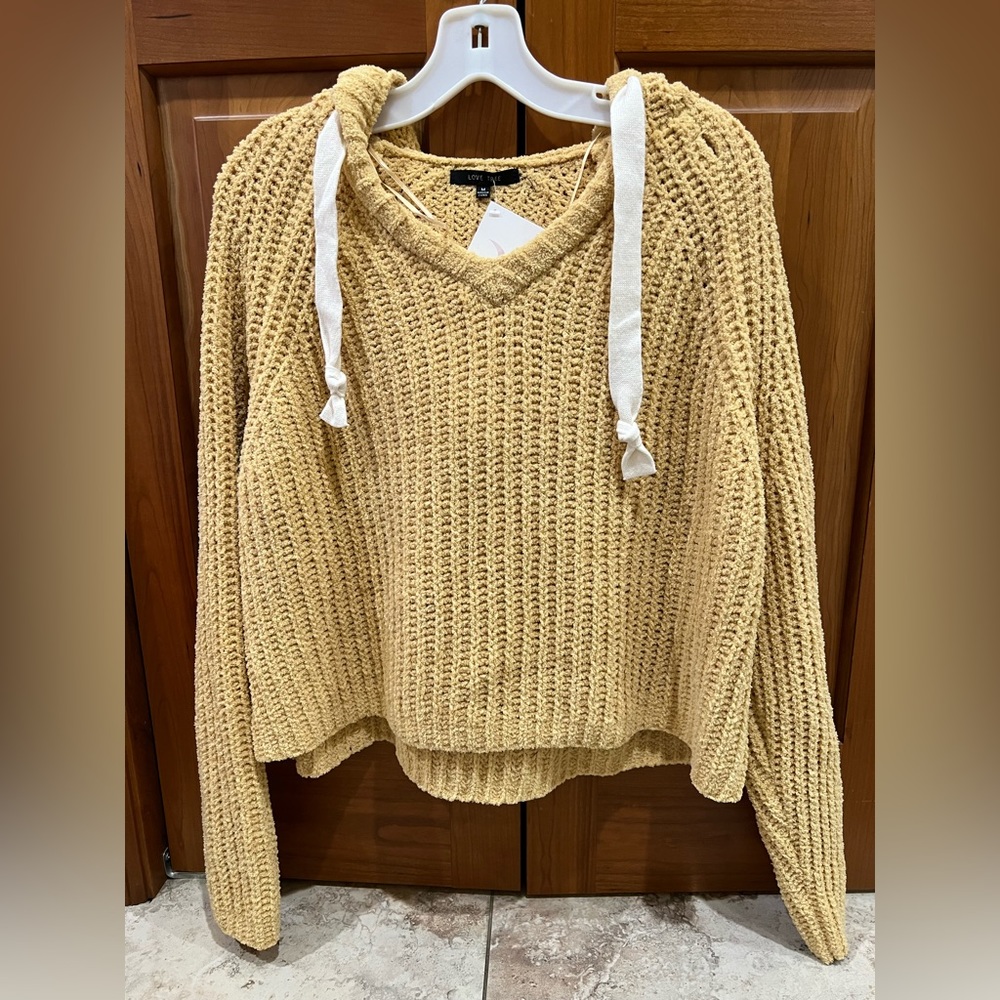 yellow sweater